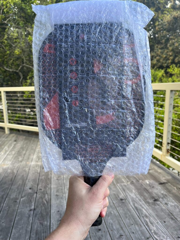 Picture of onix z5 graphite paddle coming in bubble wrap.