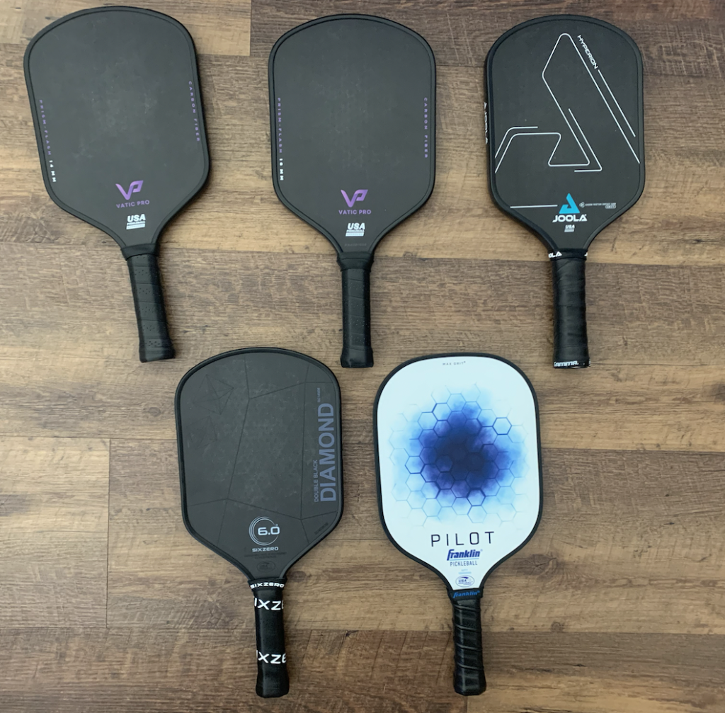 Picture of 5 different carbon fiber paddles.