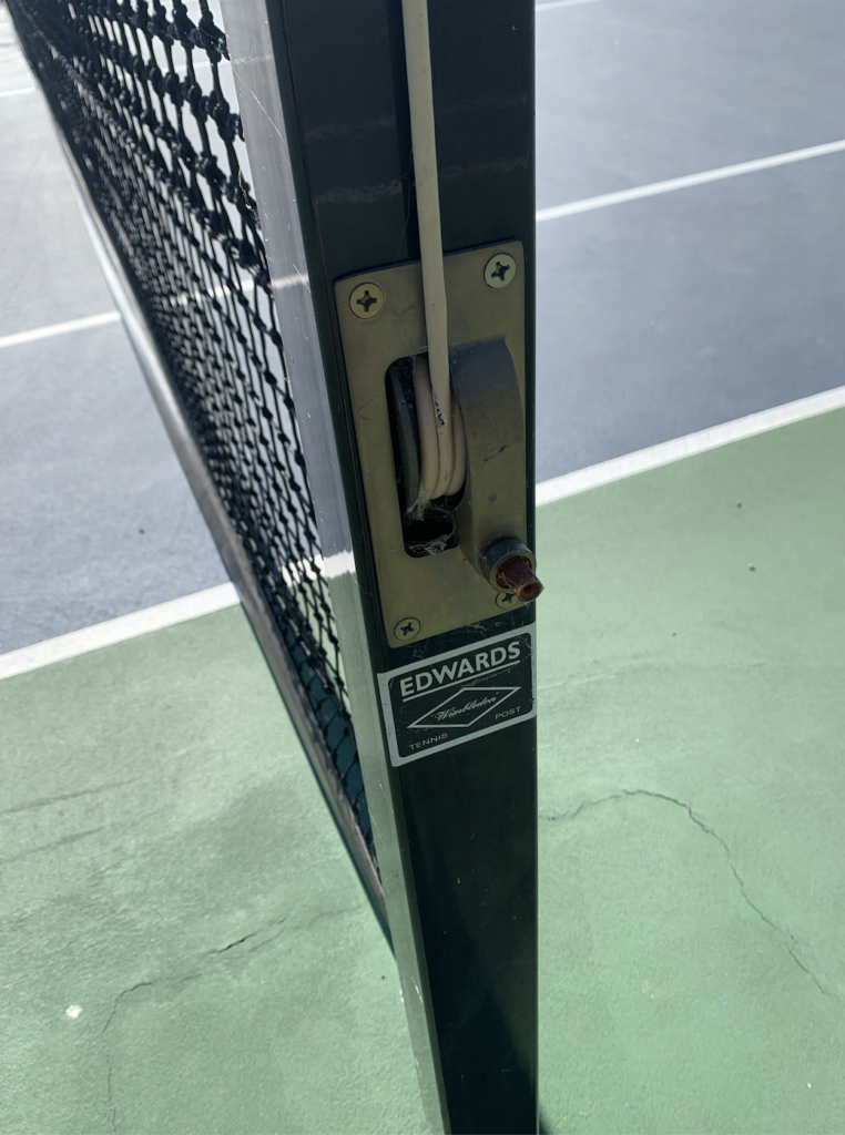 Picture of a tennis net that you would have to lower for a pickleball net