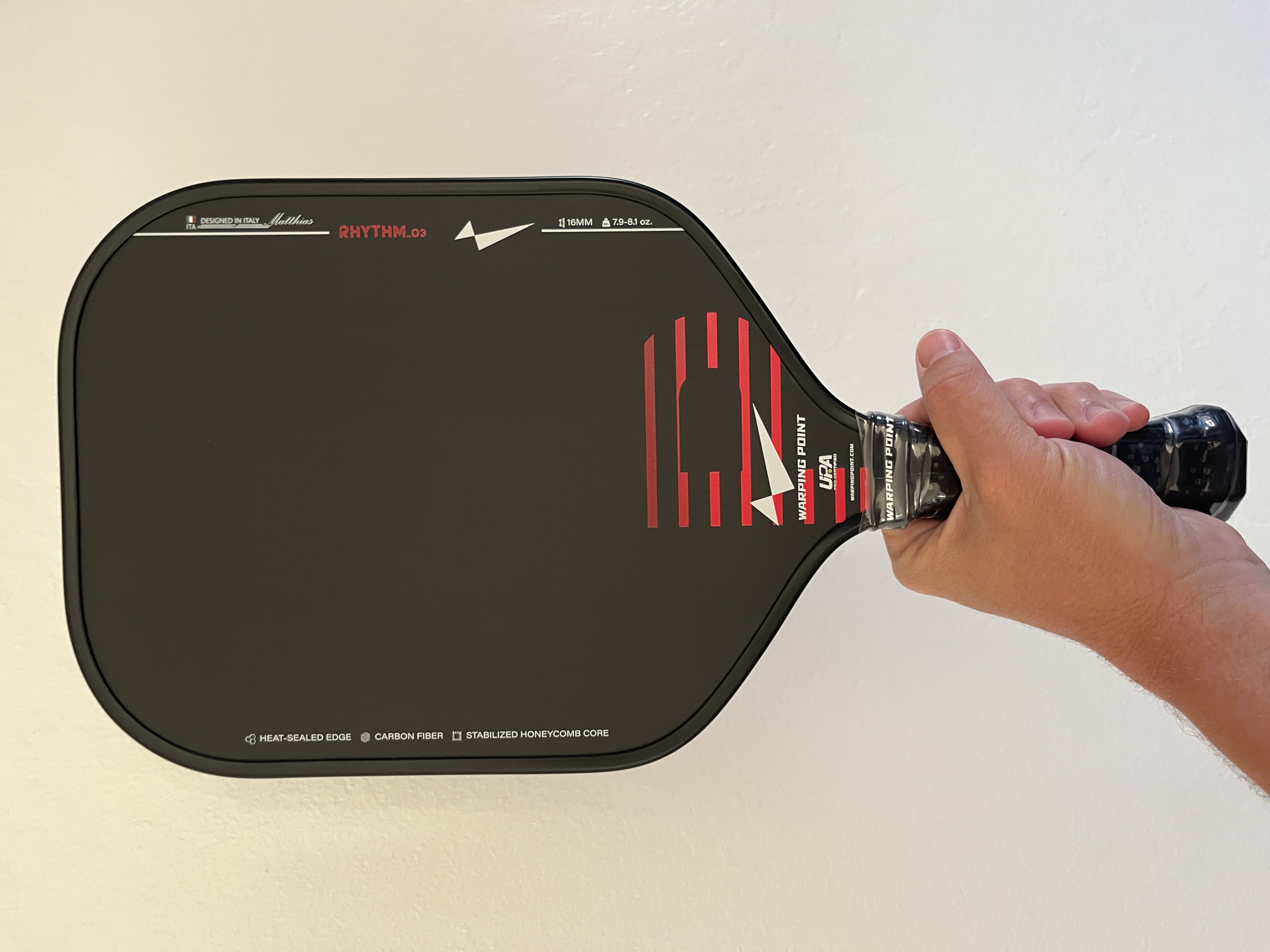 Closer up picture of the Warping Point Rhythm pickleball paddle.