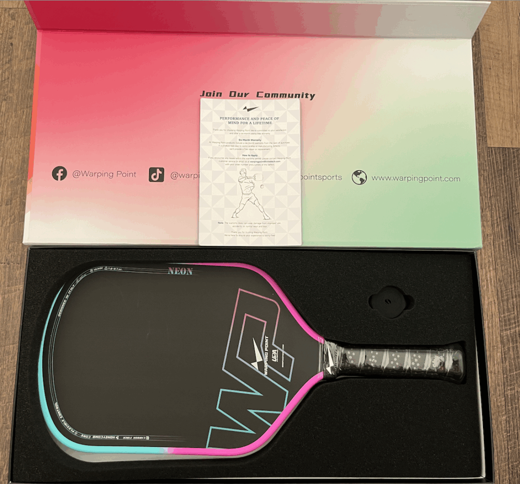 Picture of Warping Point neon in a box.