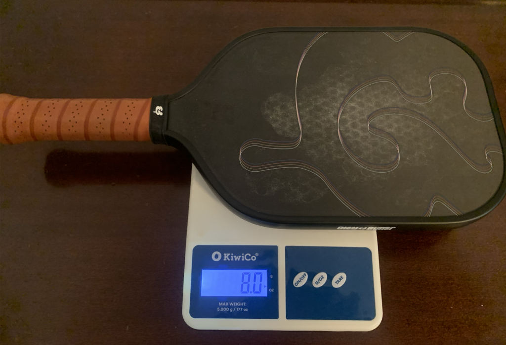 Picture showing a scale with the weight of the Bread and Butter filth paddle.