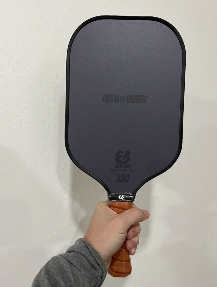 Picture of the face of the Bread and Butter drip pickleball paddle