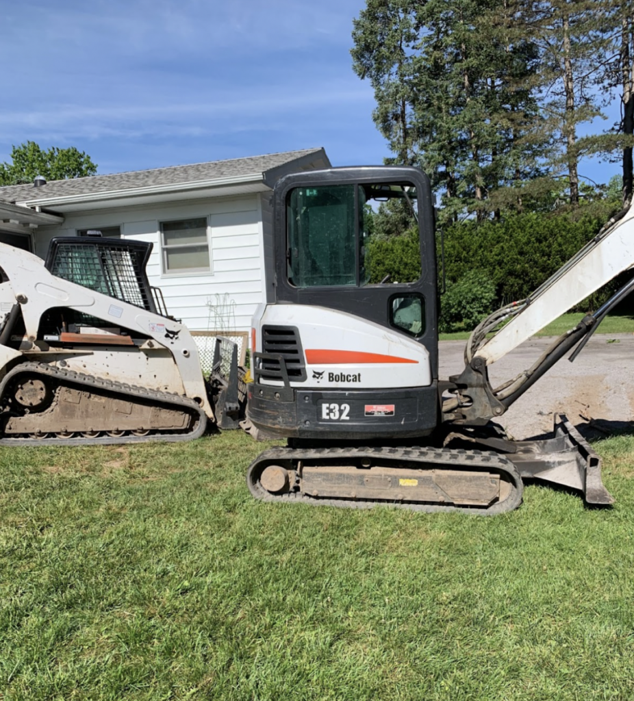 Heavy equipment brought in for the backyard pickleball court