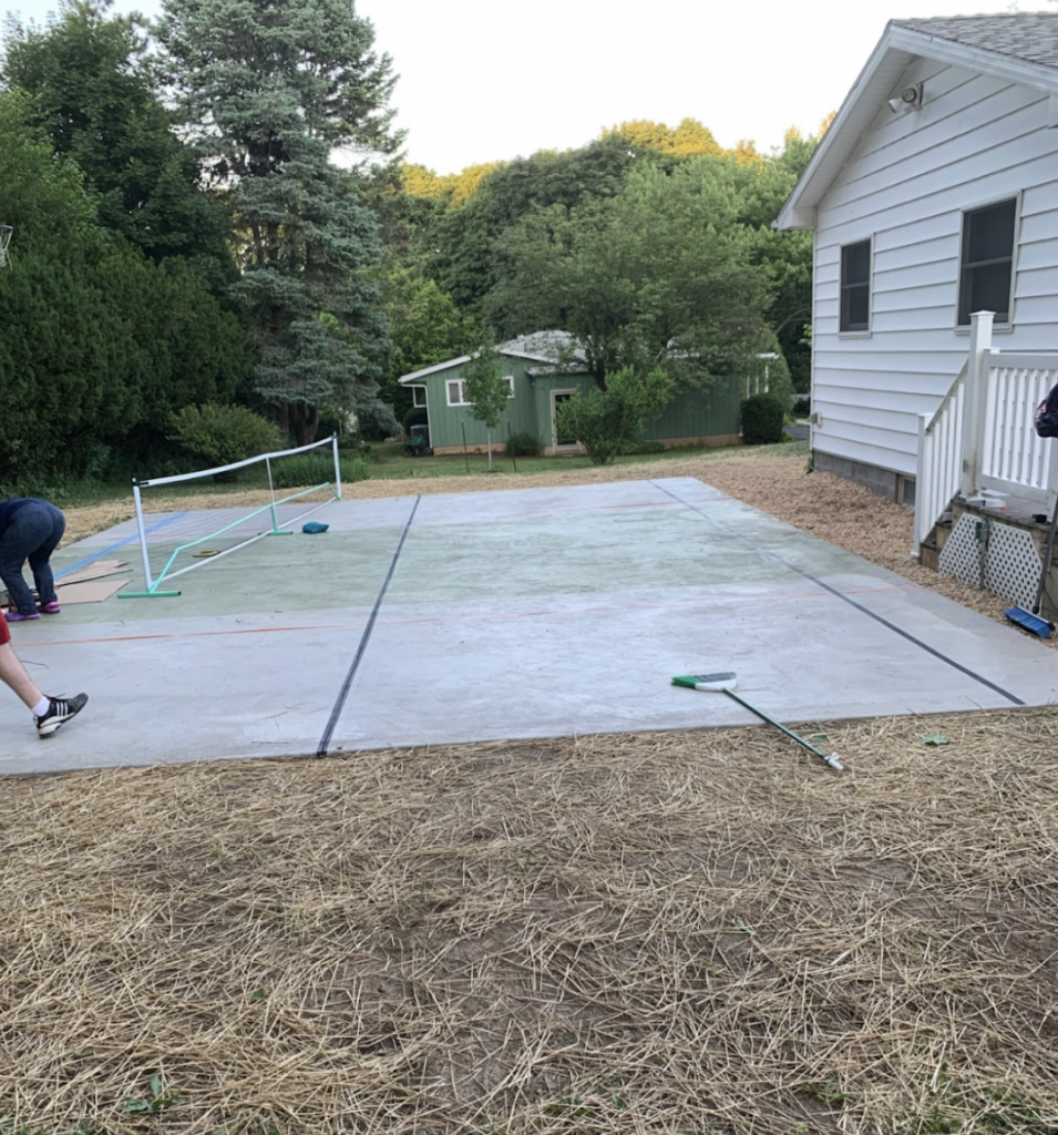 Picture of the paint job for the cheapest backyard pickleball court