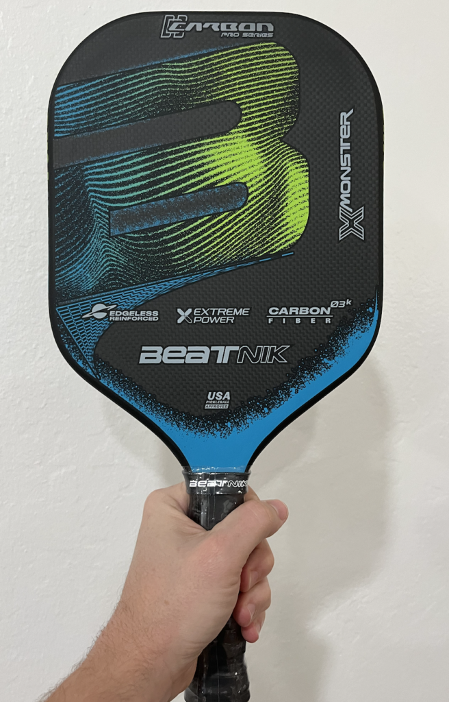 Picture of beatnik x monster pickleball paddle.