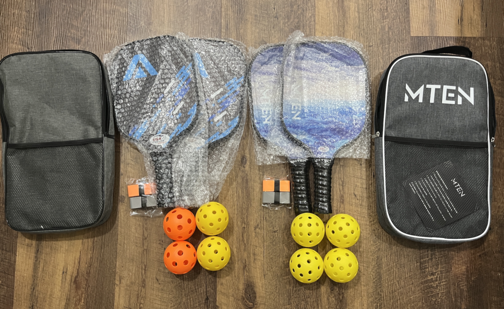 MTEN pickleball paddle set unboxing experience with the acessories compared to the VoicePTT pickleball paddle unboxing.