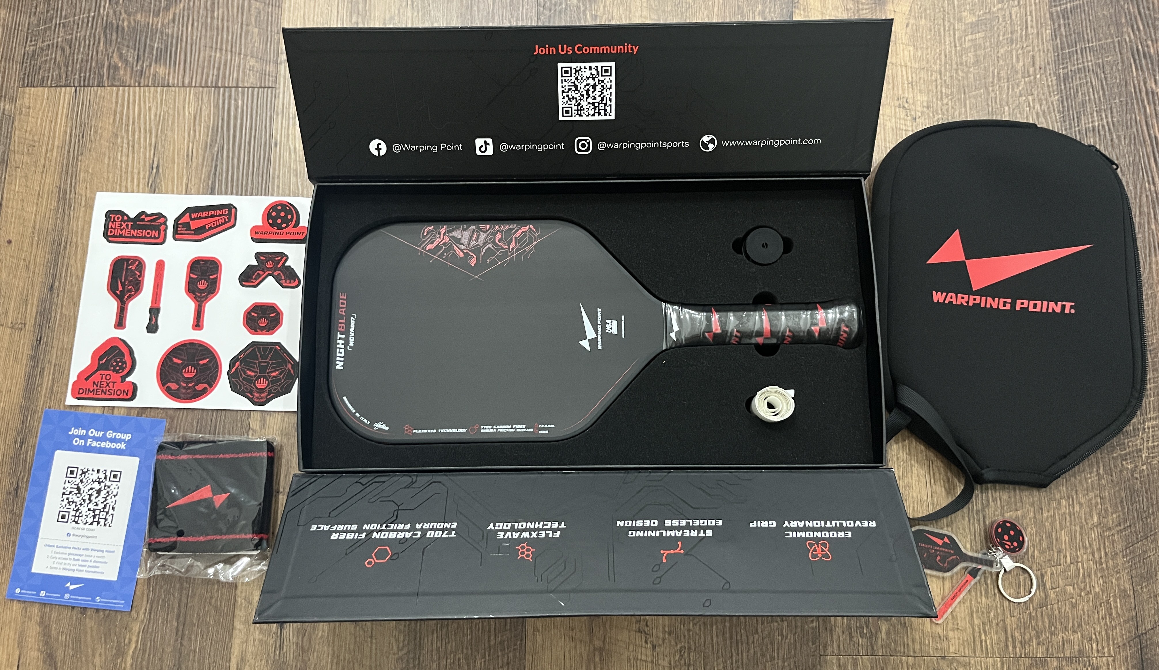 Picture showing the pickleball paddle and all the accessories in the Warping Point Nightbalde box.