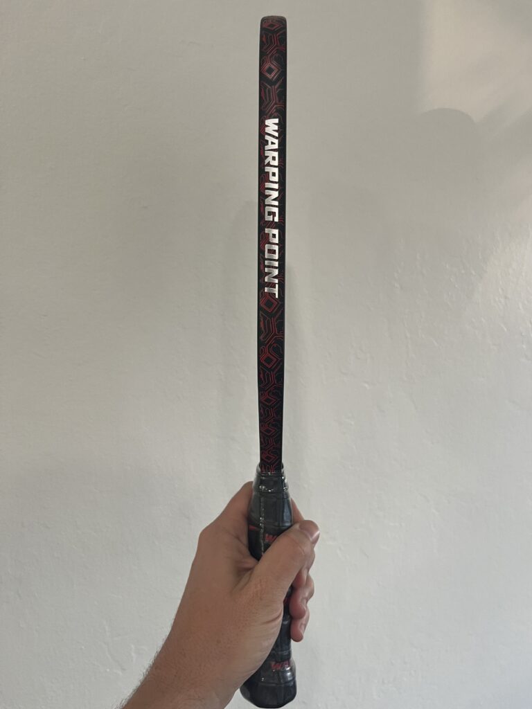 Picture of side view of Warping Point Nightblade pickleball paddle.