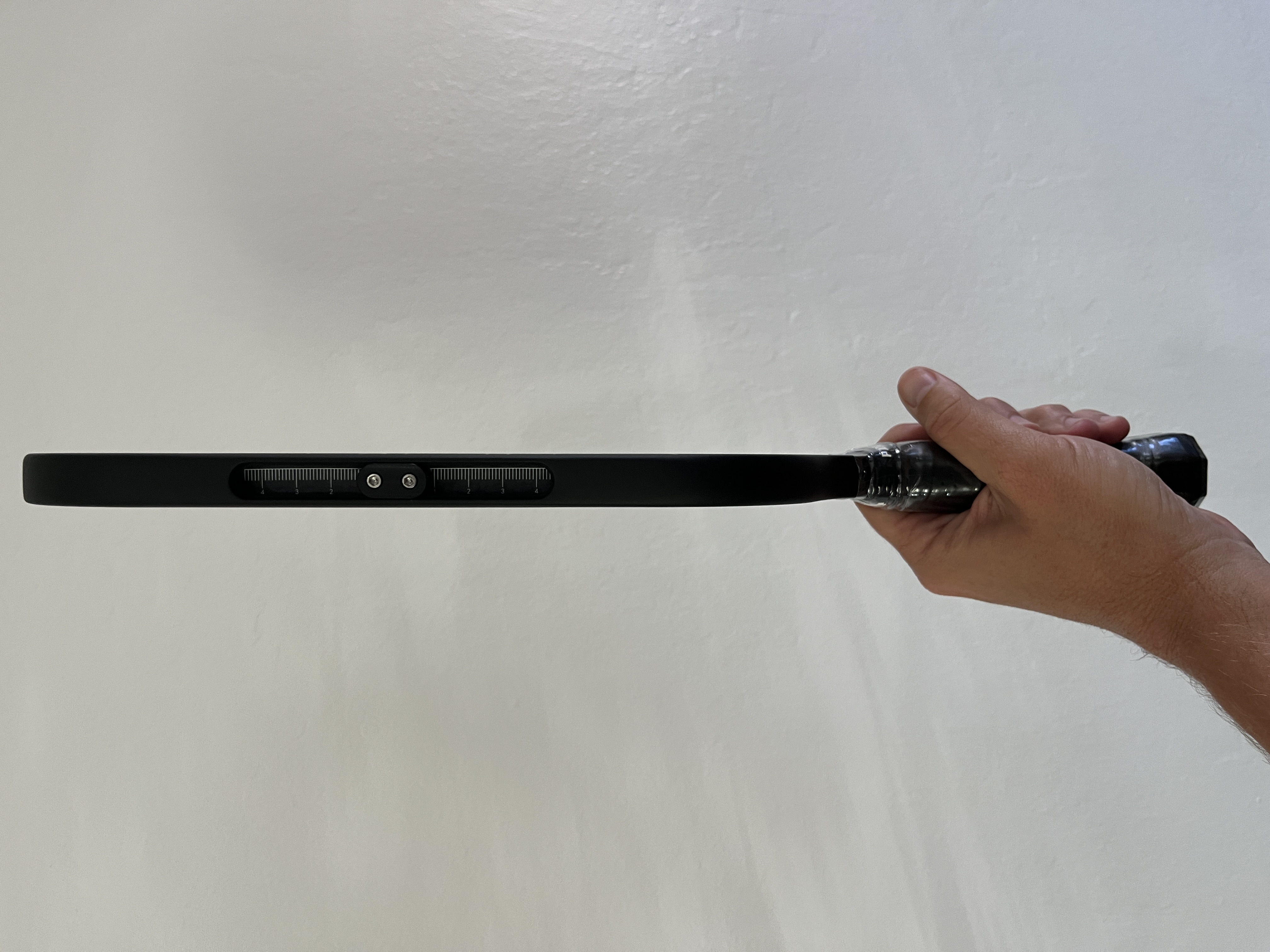 Side angle picture of the 
Paddlesshop Rhylion pickleball paddle.