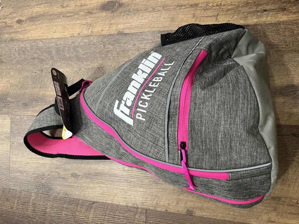 Picture of the Franklin pickleball bag with shoes and paddles in the bag.