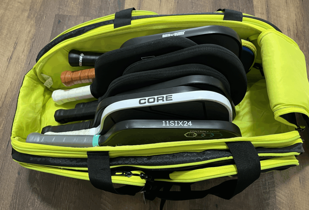Picture of 9 pickleball paddles that can be held in the Joola Tour Elite pickleball bag.