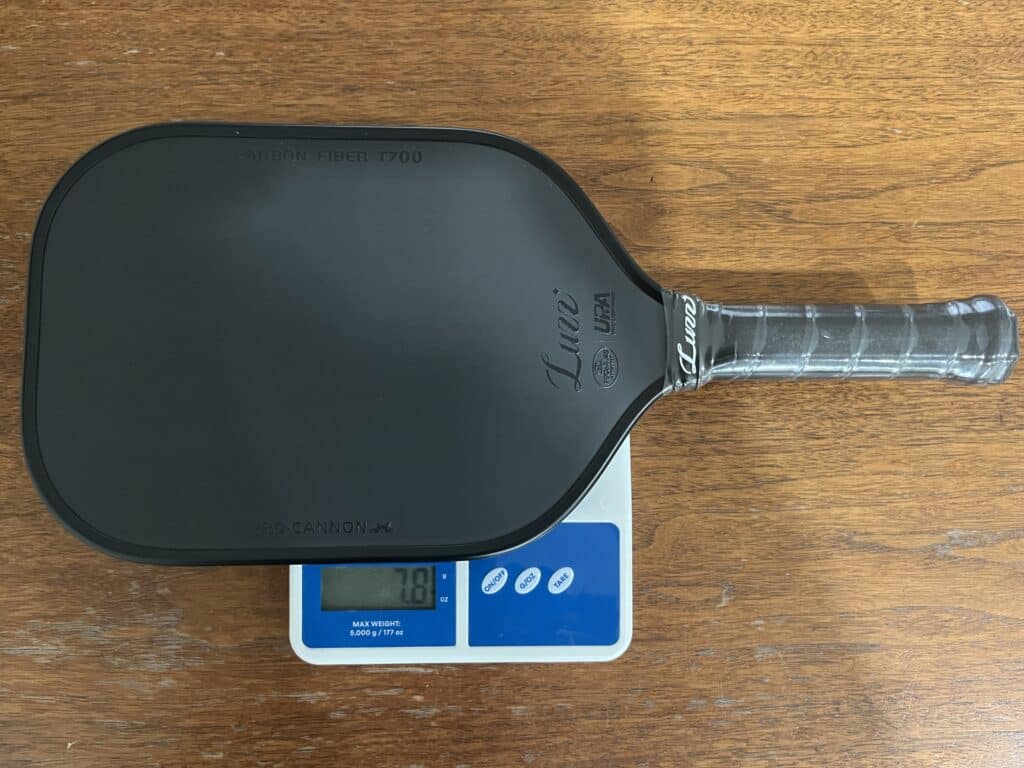 Picture of the Luzz Cannon pickleball paddle weighing 7.8 ounces.
