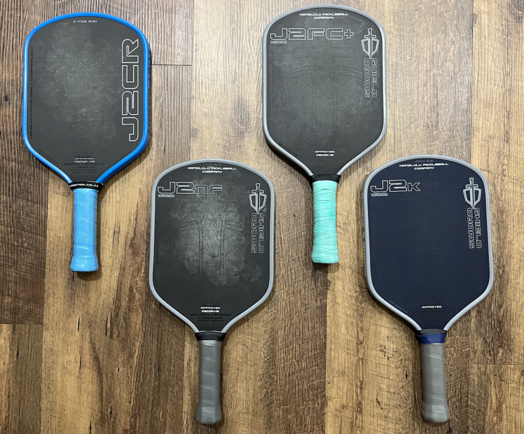 Picture showing J2CF vs J2NF vs J2FC+ vs J2K pickelball paddles.