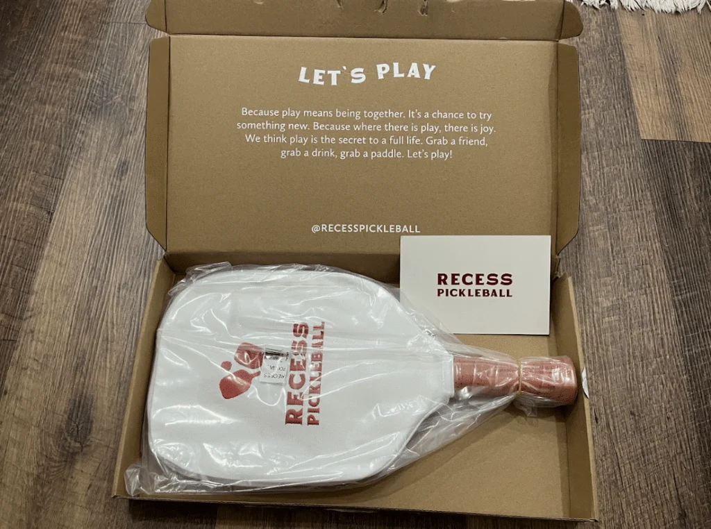 Picture of recess pickleball paddle box with paddle.