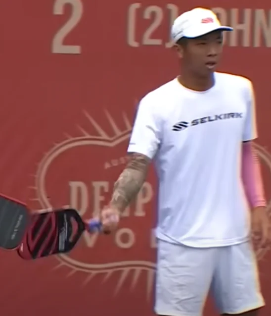Quang Duong with Selkirk paddle