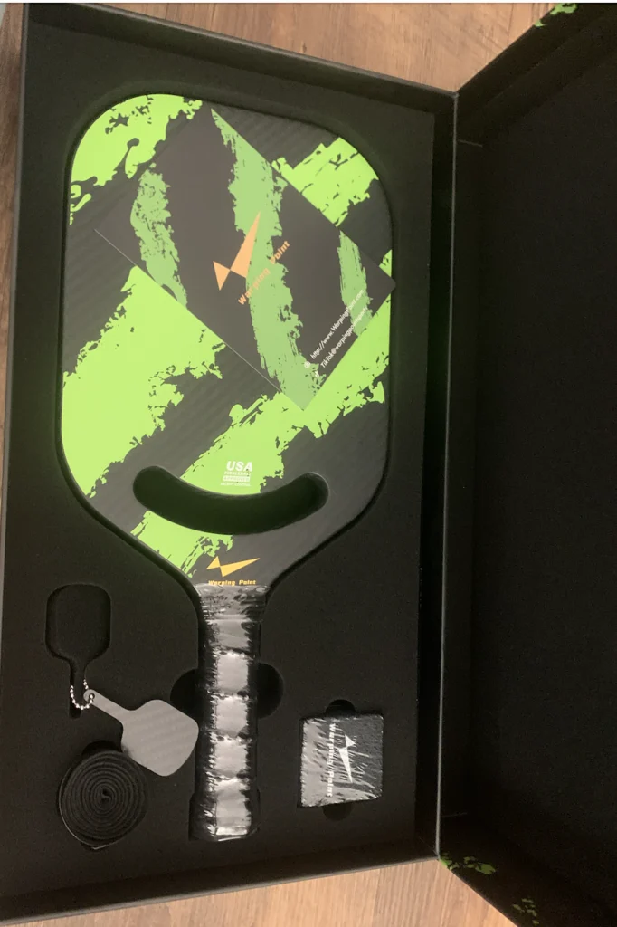 Picture of Warping Point pickleball paddle in the box